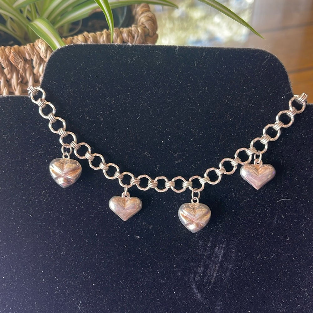 Sterling silver charm bracelet.